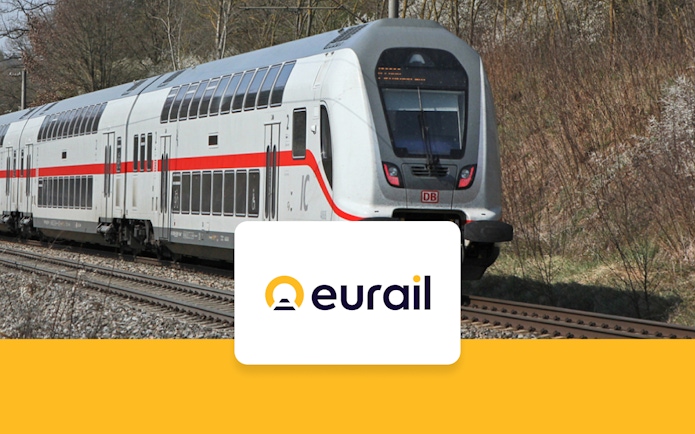 Eurail train on tracks in Germany with Eurail logo.