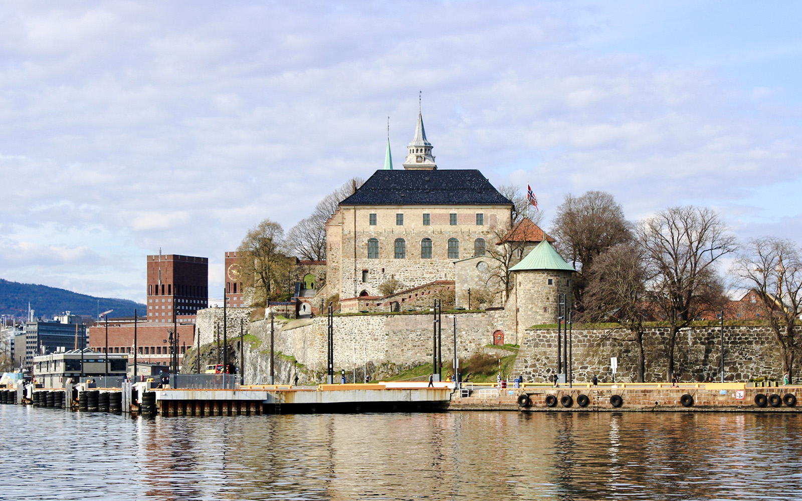 Akershus Fortress viewed from Oslofjord during sightseeing cruise.
