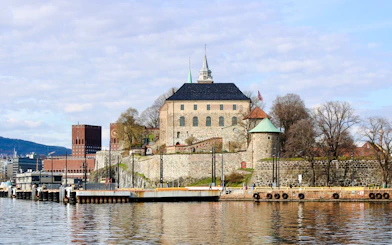 Akershus Fortress viewed from Oslofjord during sightseeing cruise.