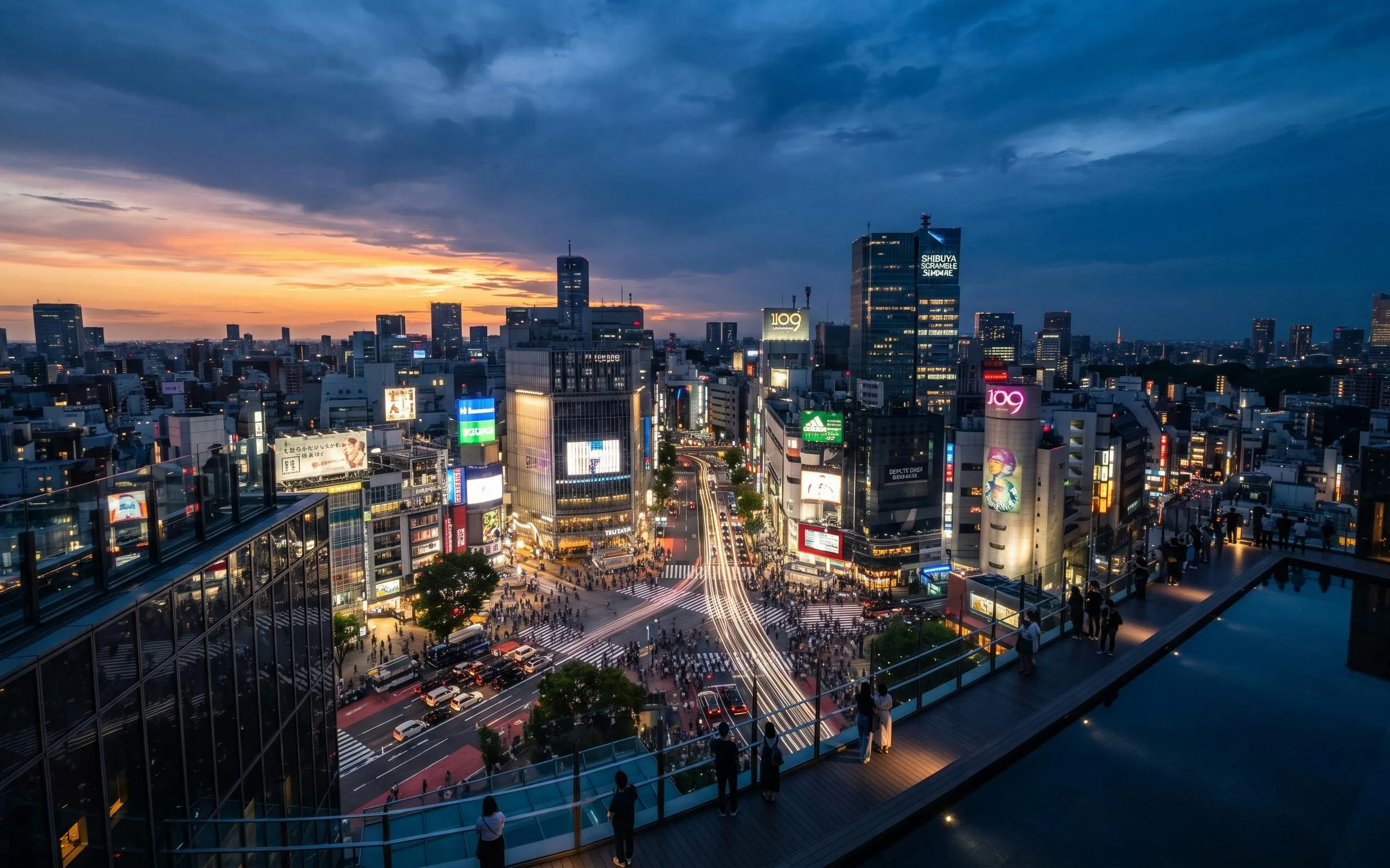 Shibuya Scramble Crossing and city skyline at dusk from SHIBUYA SKY, Tokyo.