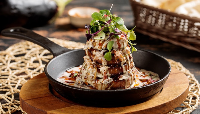 Gourgeous Eggplant tower served in dish isolated on table top view of arabic breakfast