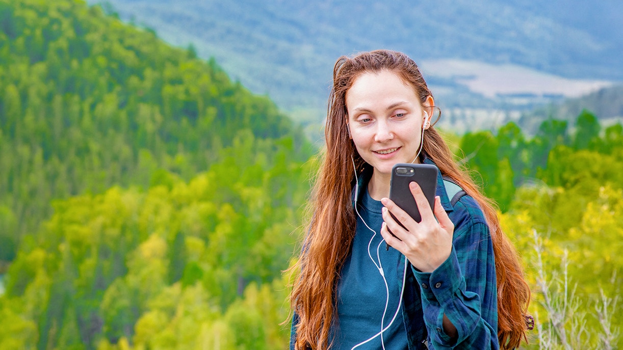 woman using audio guide