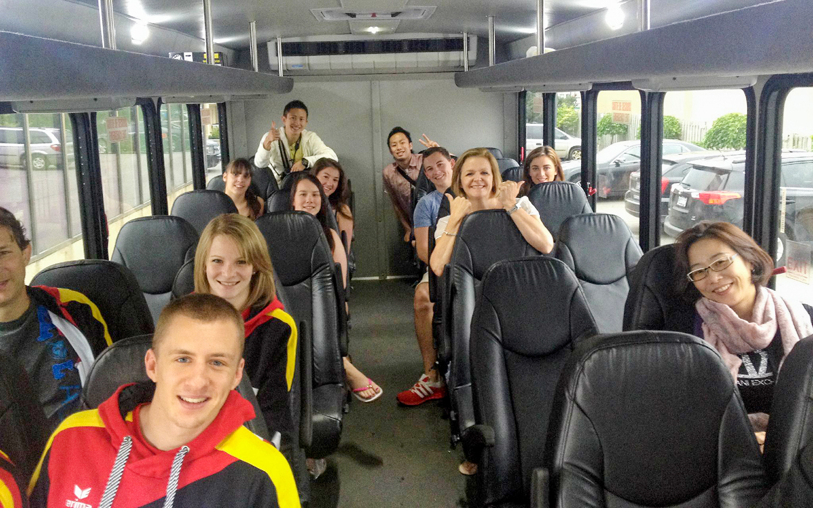 Tour group on a bus departing from Toronto for a Niagara Falls day trip.