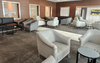 Sofa and chairs in Plaza Premium Lounge, Cairo airport.