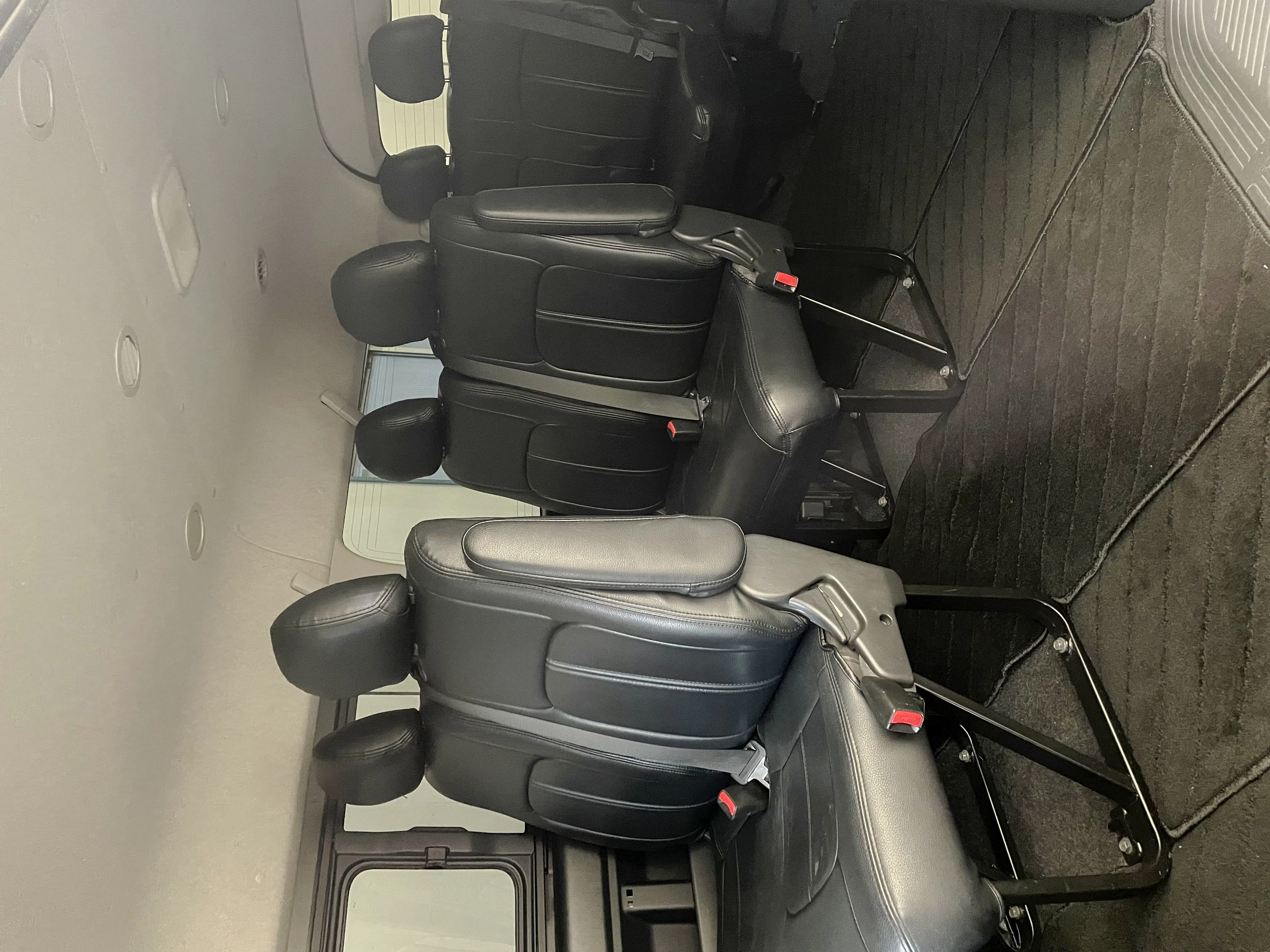 Private transfer vehicle interior with leather seats for Kansai Airport to Osaka route.