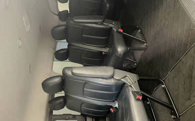 Private transfer vehicle interior with leather seats for Kansai Airport to Osaka route.