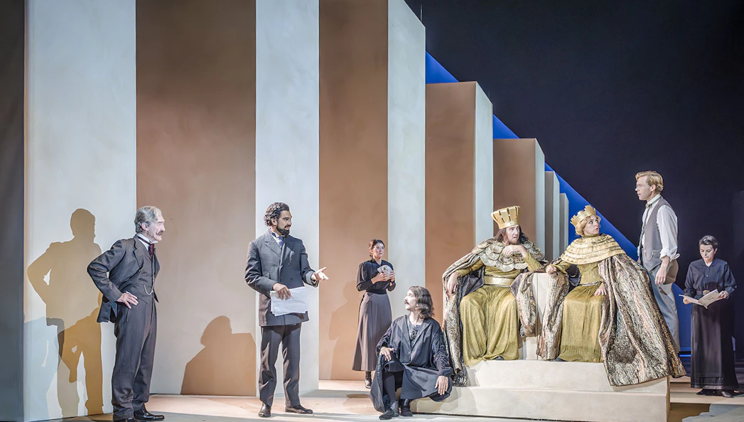 Performers in period costumes on stage during Grace Pervades West End show.
