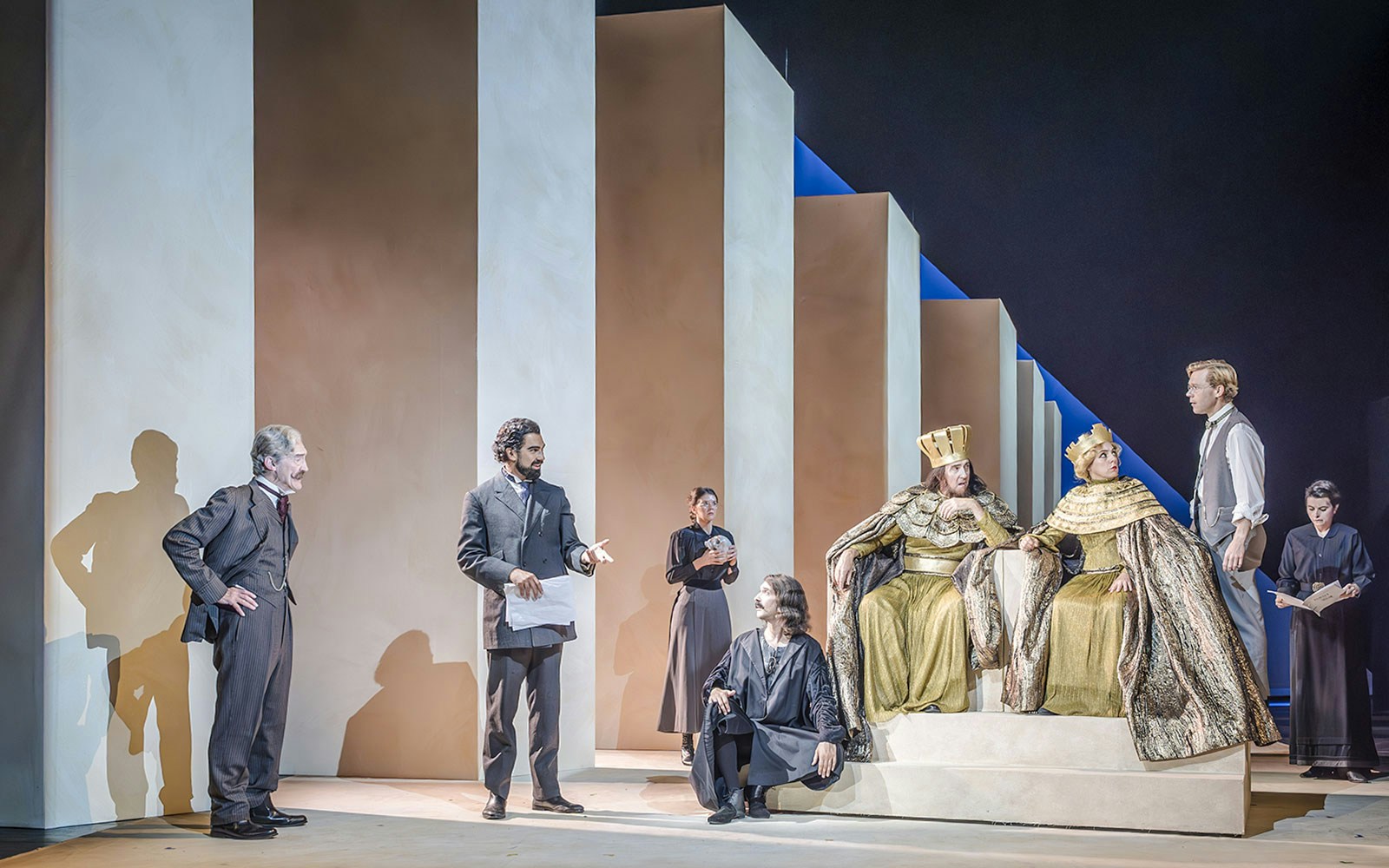 Performers in period costumes on stage during Grace Pervades West End show.