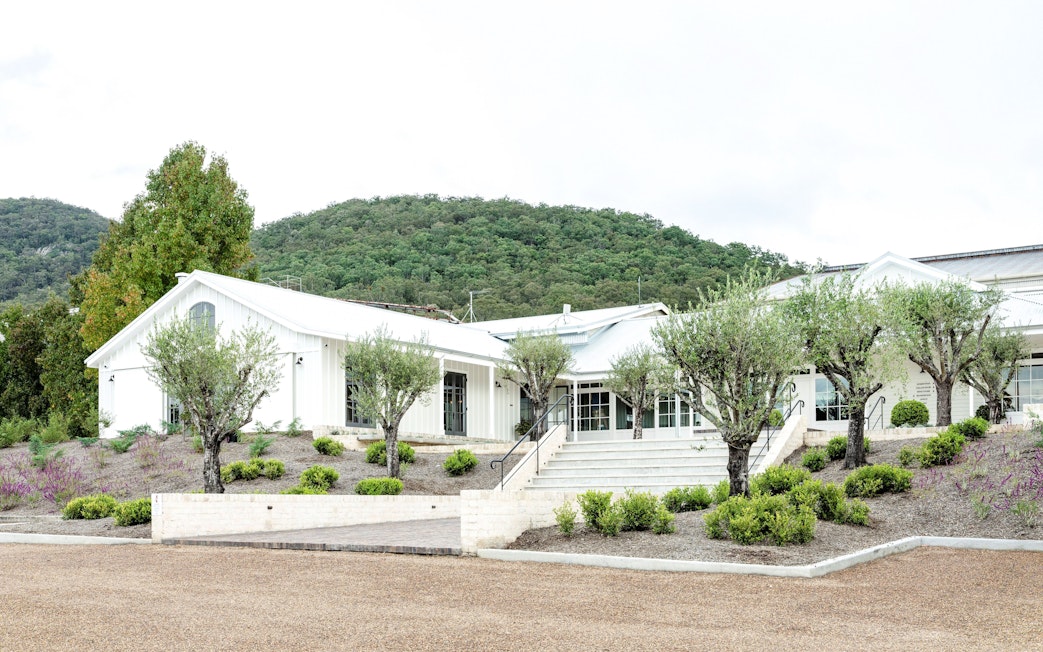 Winery building surrounded by trees in Hunter Valley, Australia.