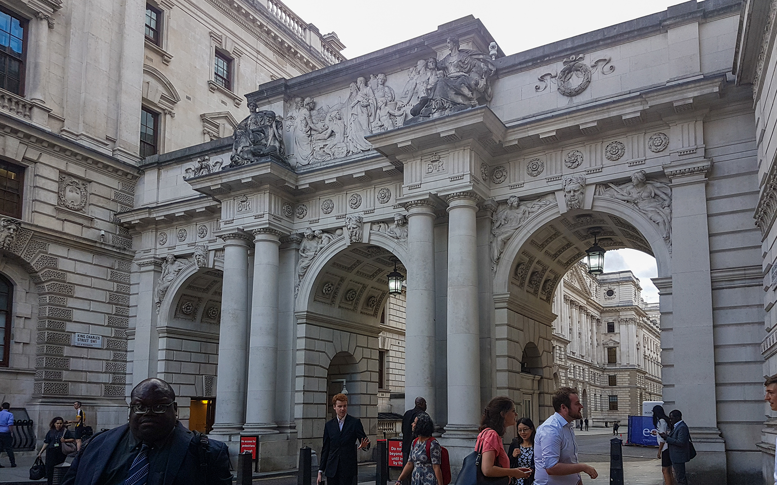 Westminster building entrance with ornate archway, part of the walking tour to Churchill's War Rooms.