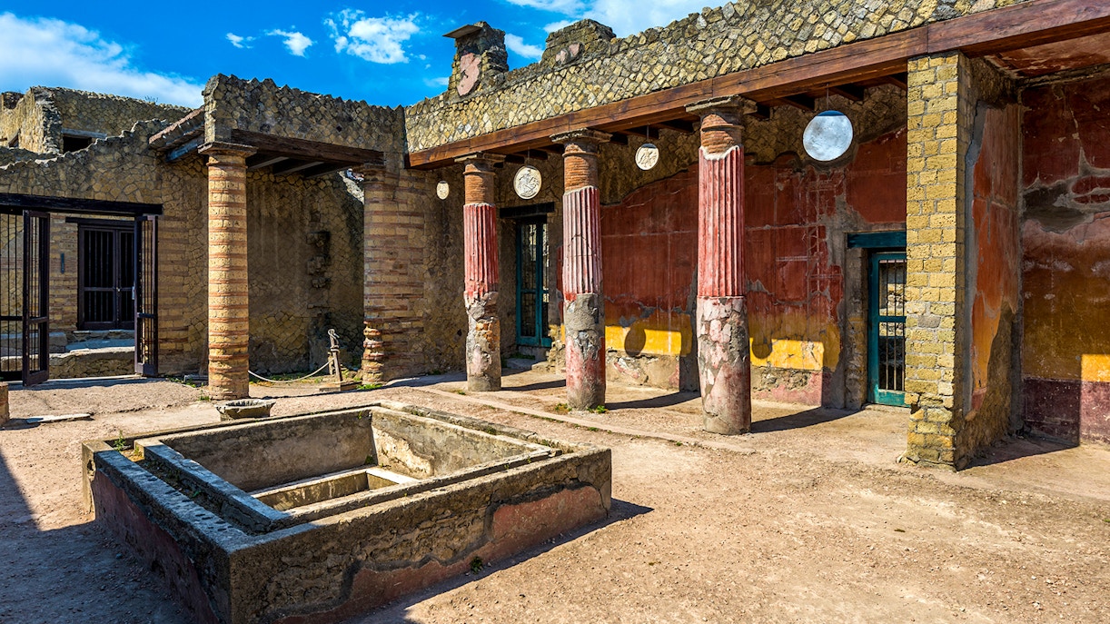Herculaneum Ruins with ancient stone structures and preserved frescoes in Italy.
