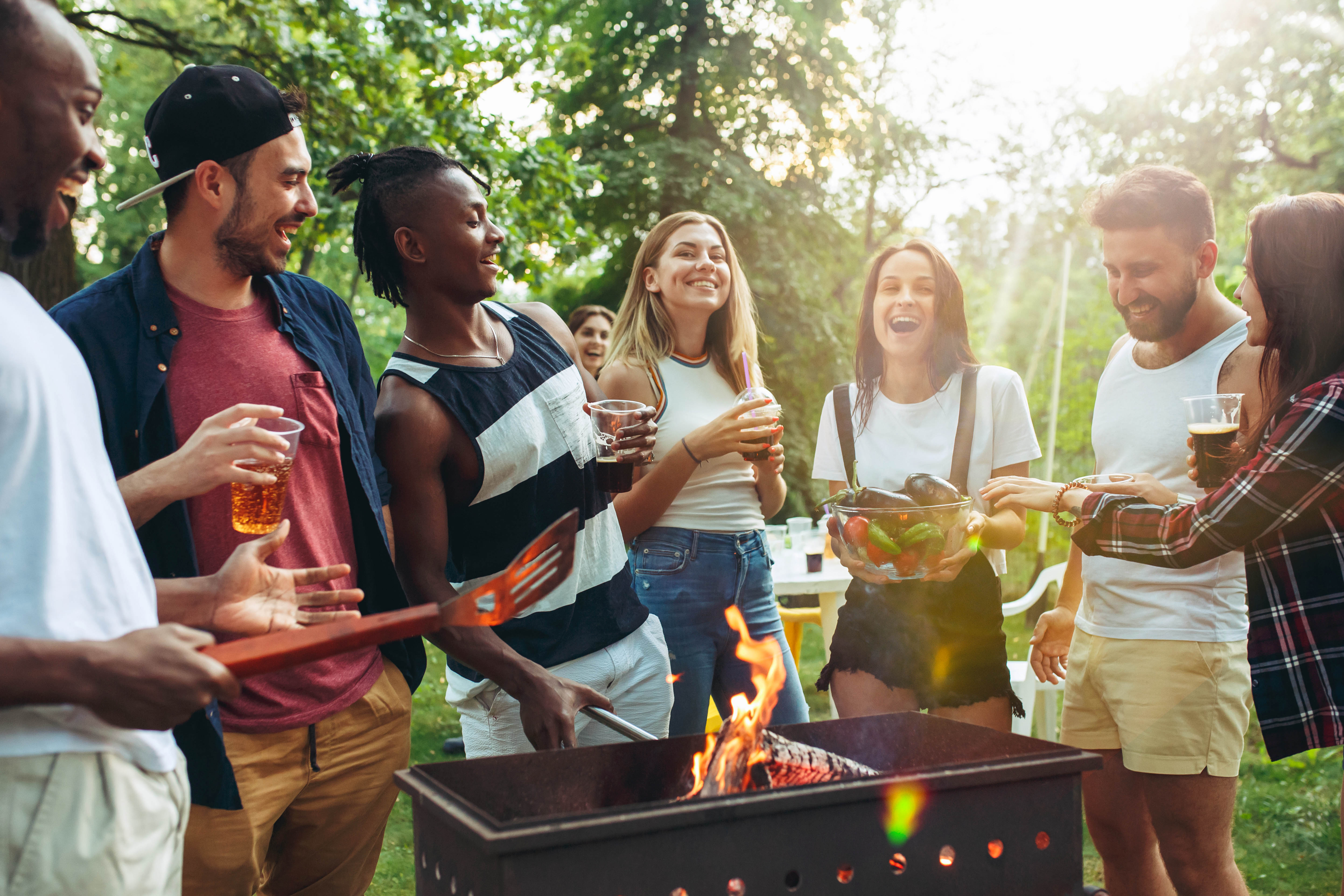 Group of friends making barbecue