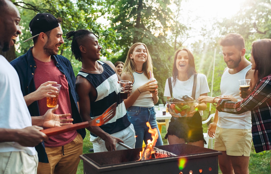 Group of friends making barbecue