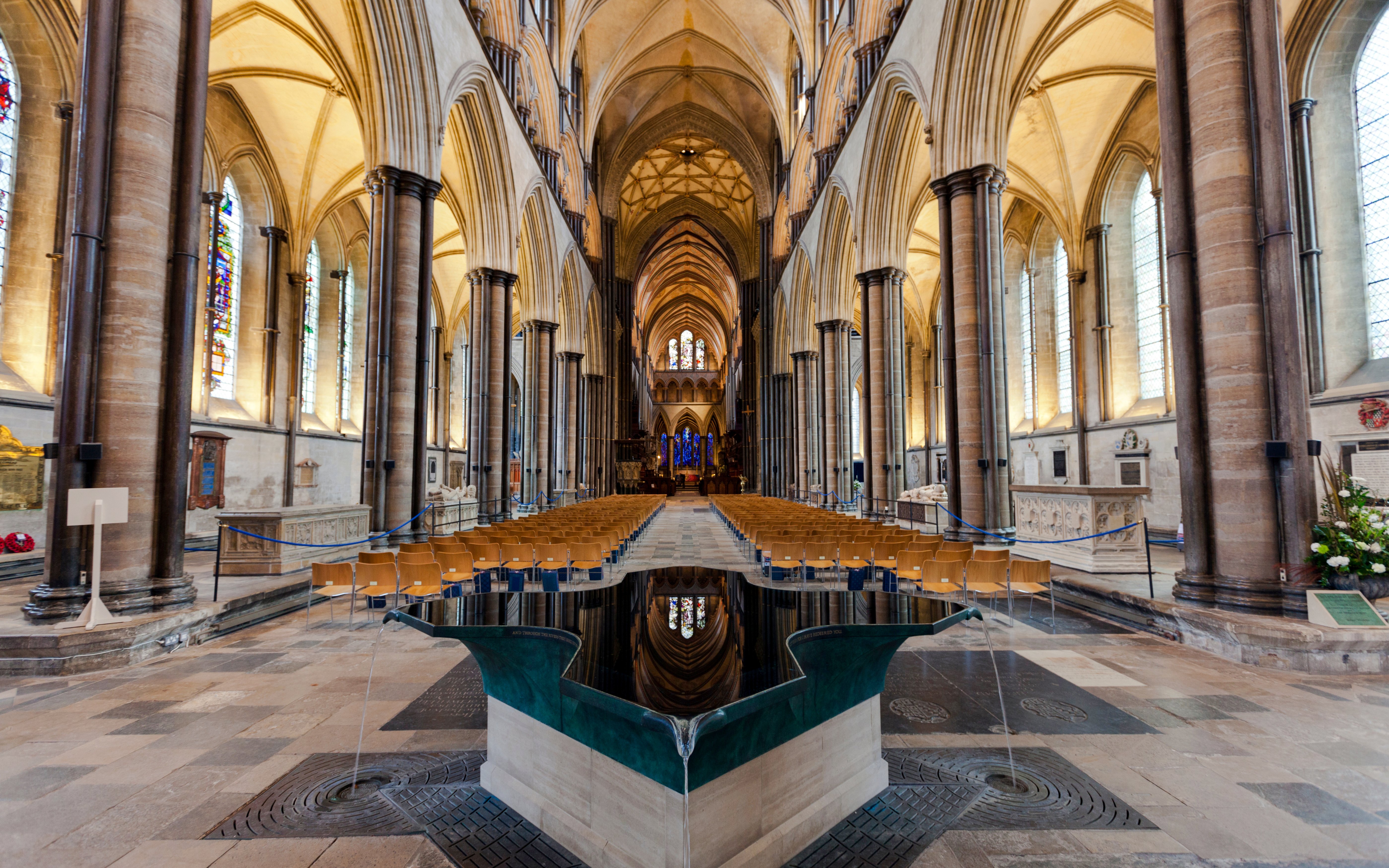 Salisbury Cathedral interior with vaulted ceilings and central nave.