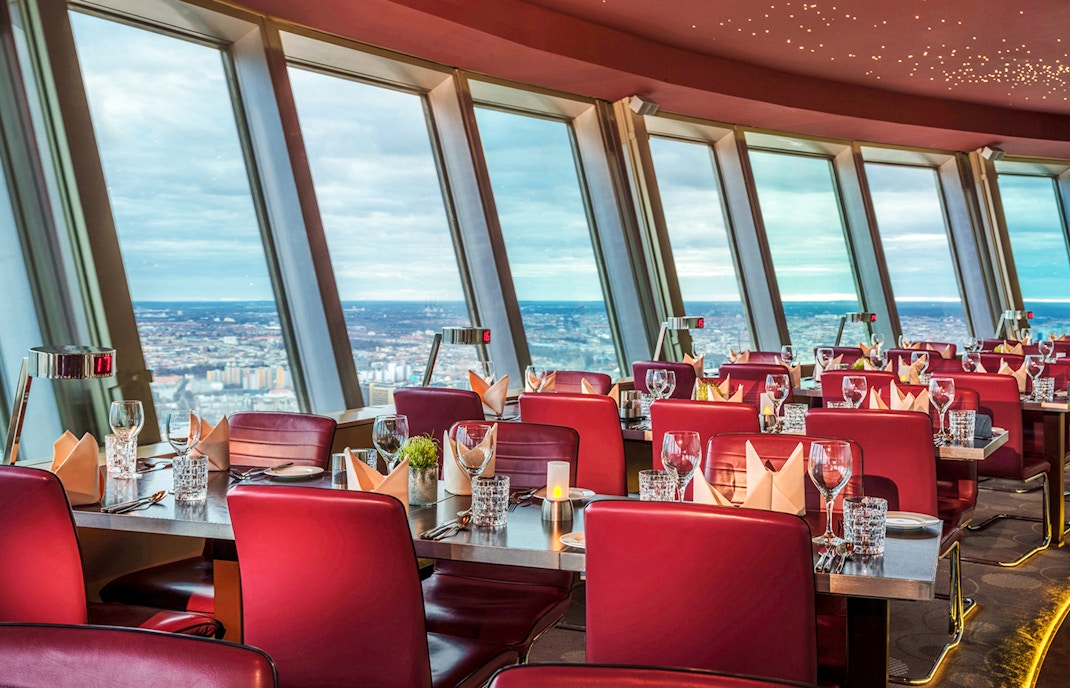 Dining experience at Berlin TV Tower with panoramic city views.