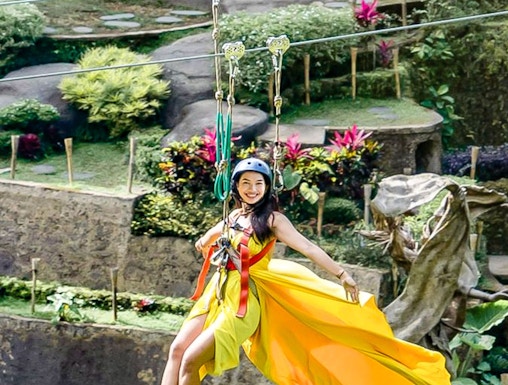 Ziplining over lush gardens at Alas Harum Bali.