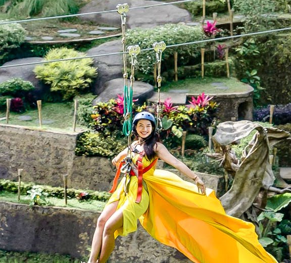 Ziplining over lush gardens at Alas Harum Bali.