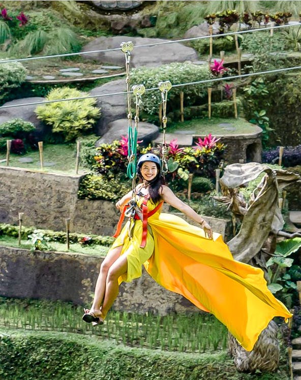 Ziplining over lush gardens at Alas Harum Bali.