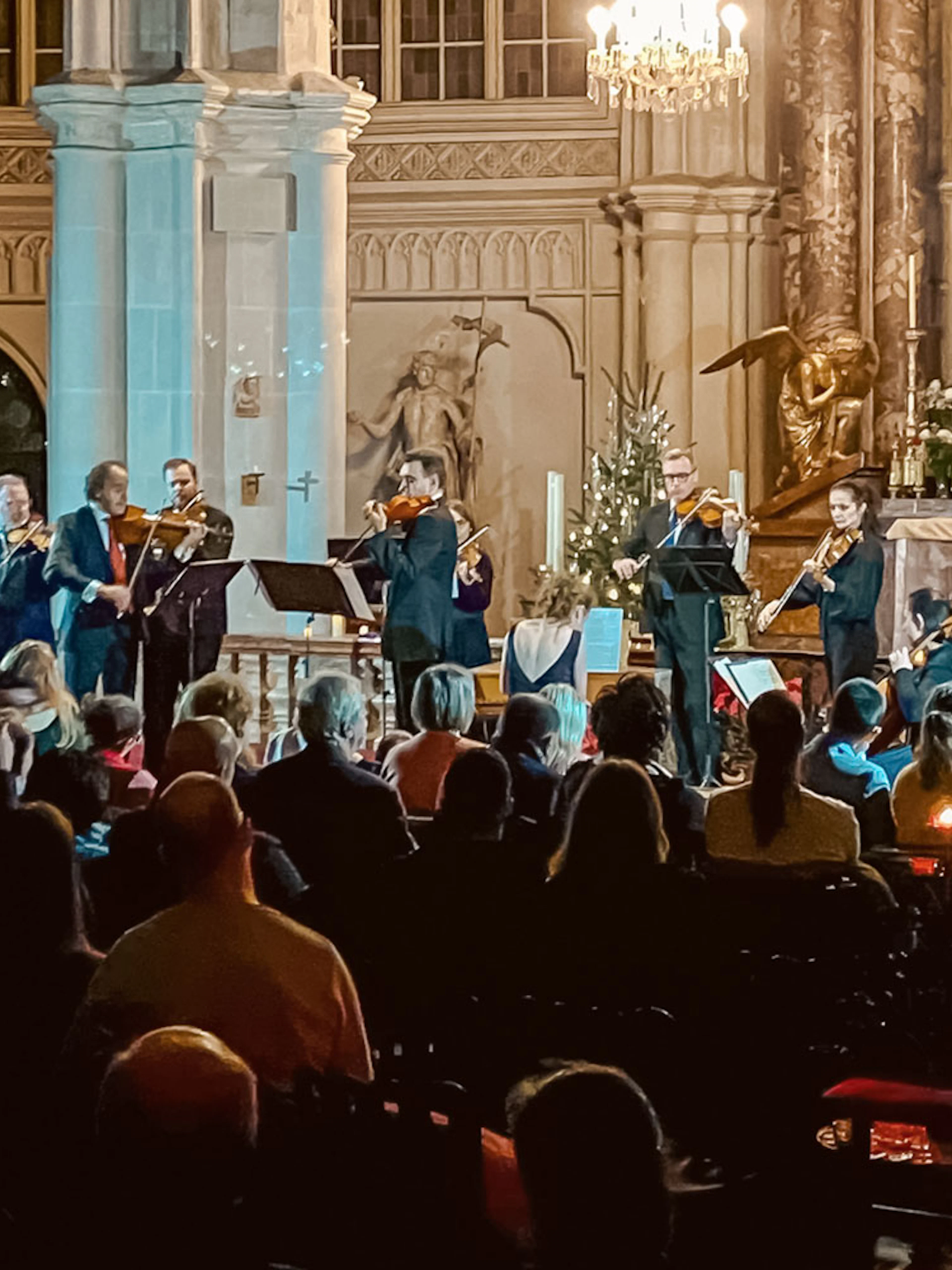 Musicians performing at a classical concert in Minoritenkirche, Vienna.