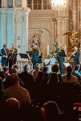 Musicians performing at a classical concert in Minoritenkirche, Vienna.