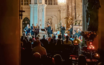 Musicians performing at a classical concert in Minoritenkirche, Vienna.