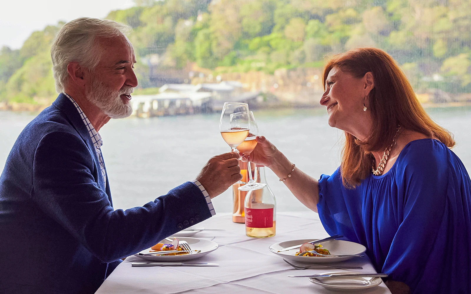 Couple enjoying lunch on a cruise of Sydney harbour