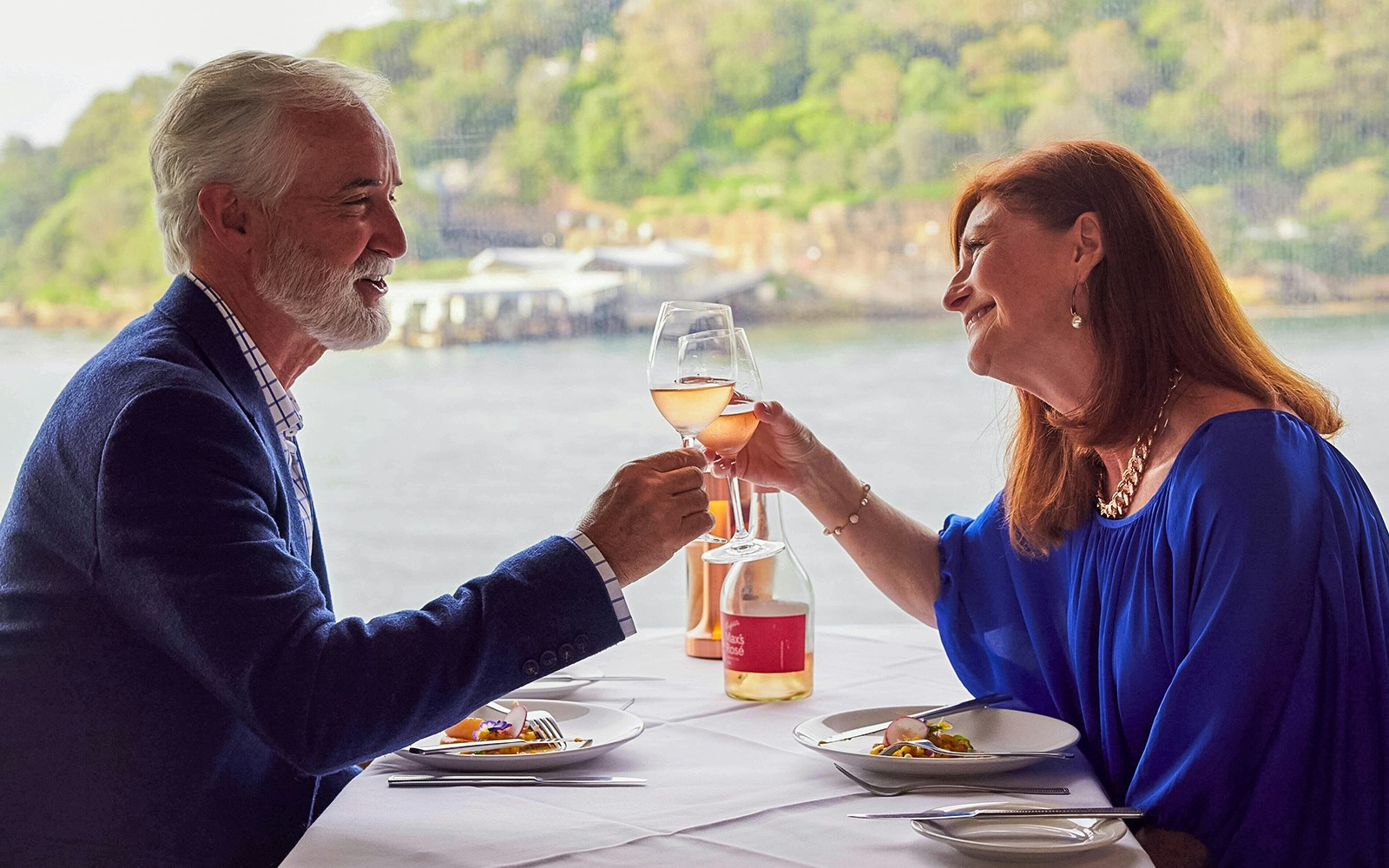 Couple enjoying lunch on a cruise of Sydney harbour