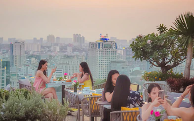 Ho Chi Minh City Night Walking Tour with Rooftop Viewpoint and Riverside Walk