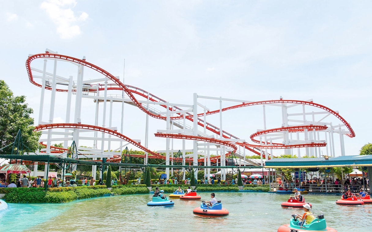 Roller coaster and bumper boats at Dream World Bangkok.