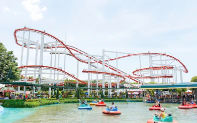 Roller coaster and bumper boats at Dream World Bangkok.