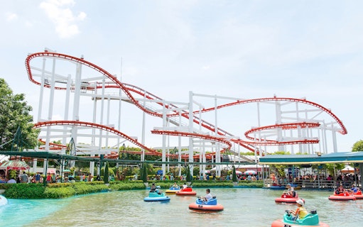 Roller coaster and bumper boats at Dream World Bangkok.