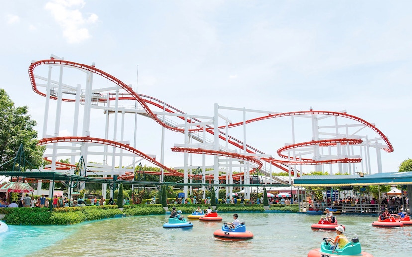 Roller coaster and bumper boats at Dream World Bangkok.