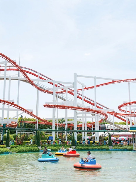 Roller coaster and bumper boats at Dream World Bangkok.