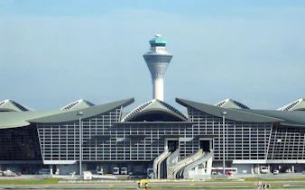 Control tower and terminal building at Kuala Lumpur International Airport.