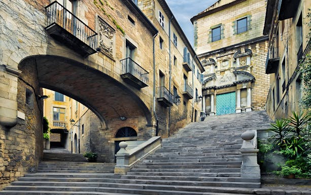 Staircase leading to Girona Cathedral, showcasing historic architecture in Catalonia, Spain.