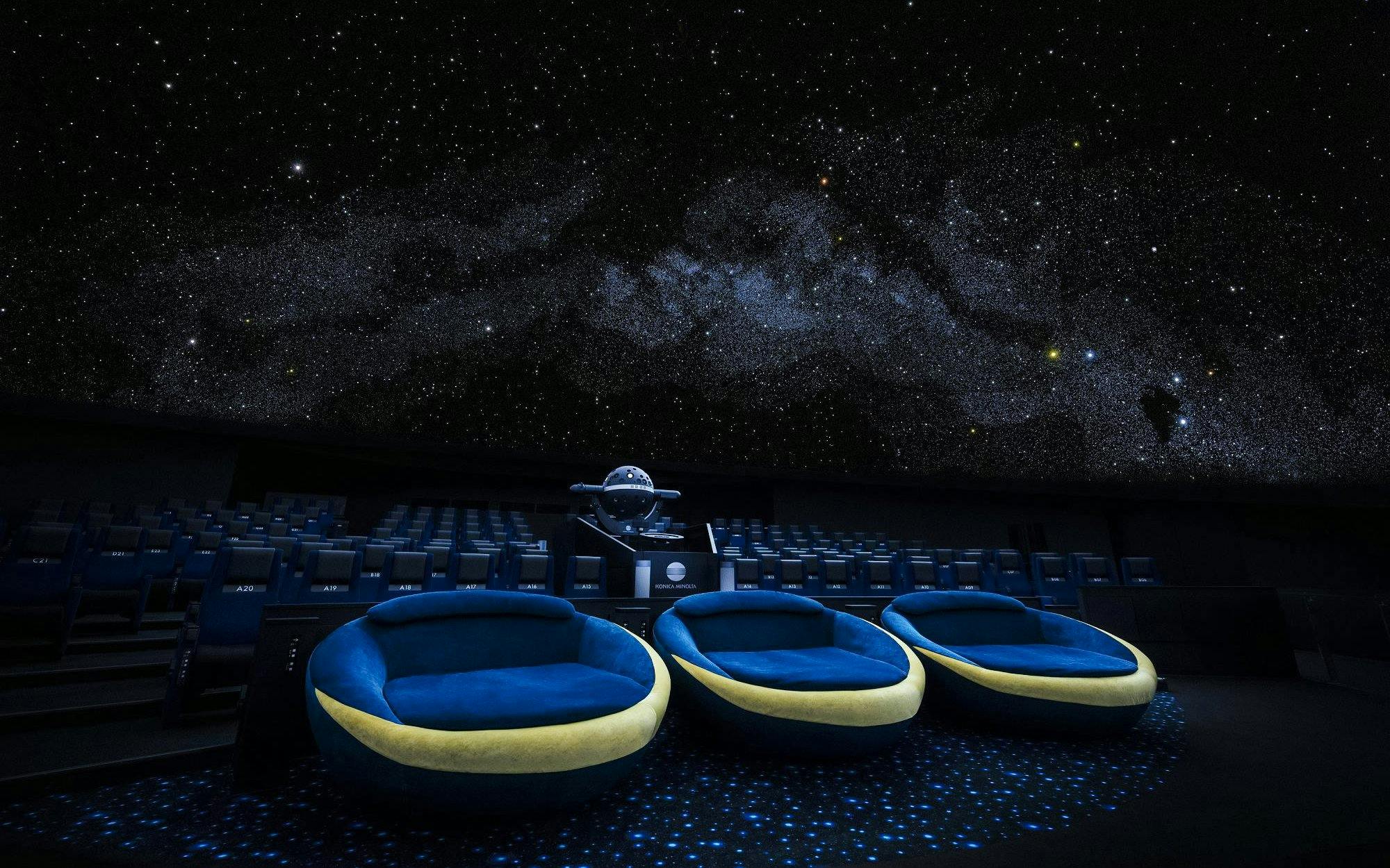 Crescent Moon Seats at Konica Minolta Planetarium Tenku, Tokyo Skytree under starry dome.