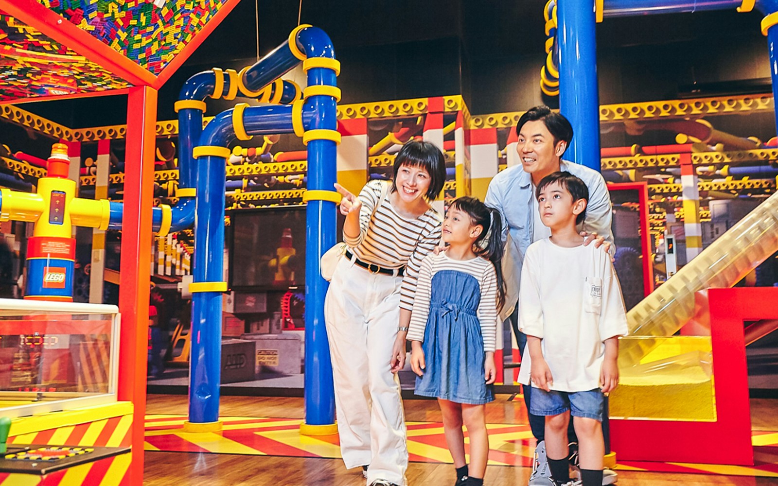 Children enjoying interactive exhibits at LEGOLAND Discovery Center in Tokyo, Japan