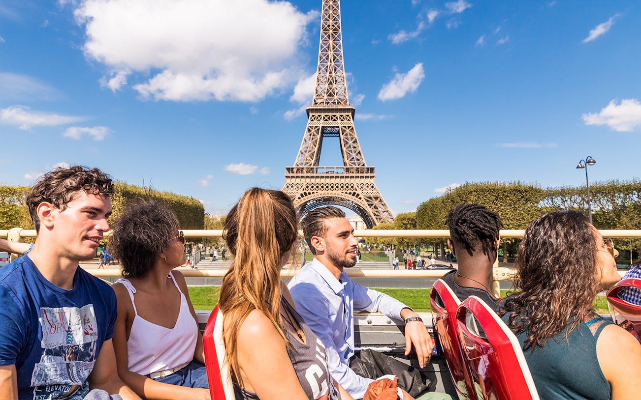 Tourists on a Big Bus tour near the Eiffel Tower in Paris.