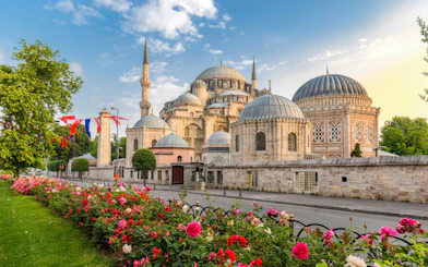 Sehzade Mosque at sunset with flowers in Istanbul, part of Old Town Segway Tour.