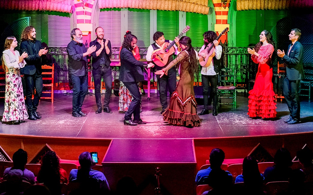 Flamenco dancers performing on stage at Only Flamenco, Seville.