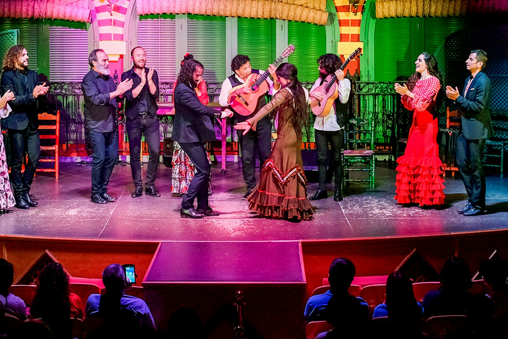Flamenco dancers performing on stage at Only Flamenco, Seville.