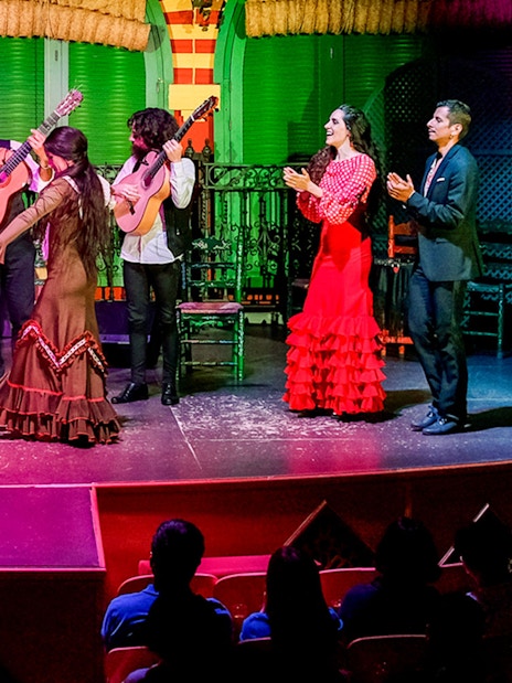 Flamenco dancers performing on stage at Only Flamenco, Seville.