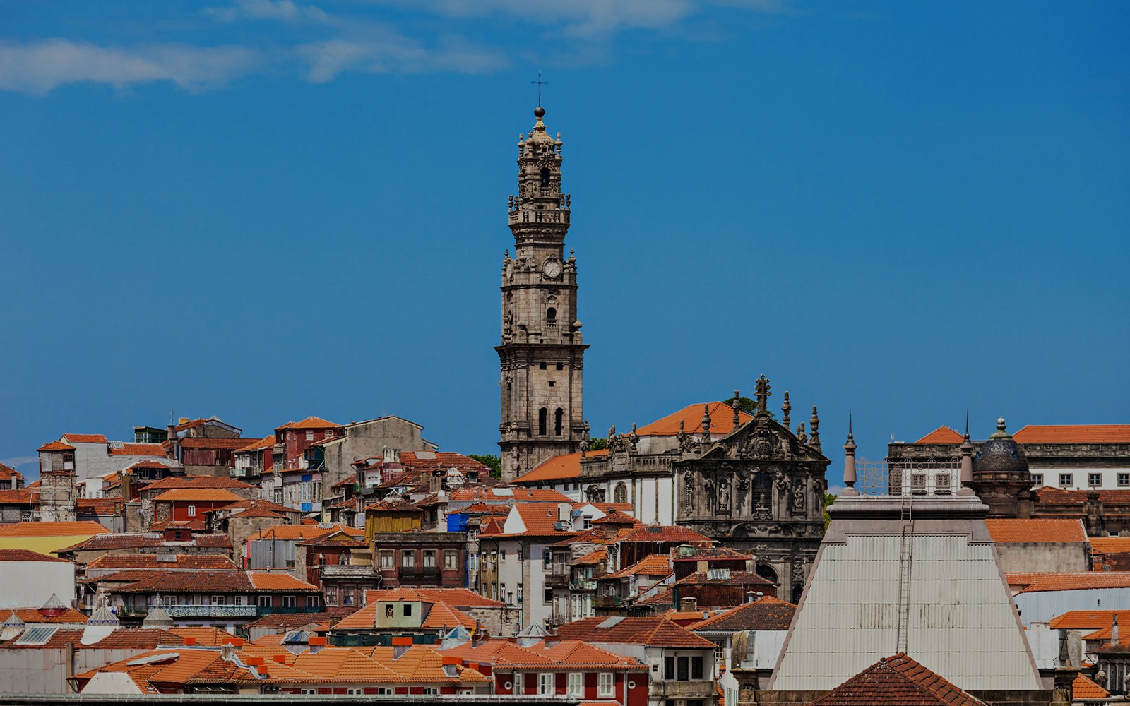 Clerigos Tower rising above the rooftops in Porto, Portugal.