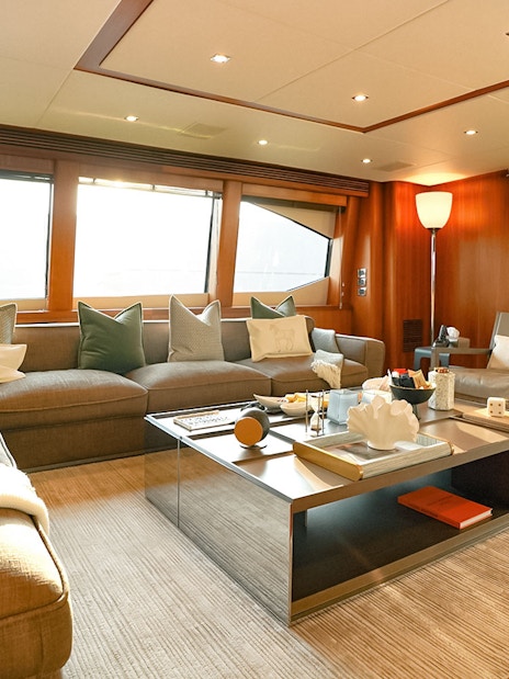 Luxurious Sunseeker superyacht interior with plush seating and elegant decor.