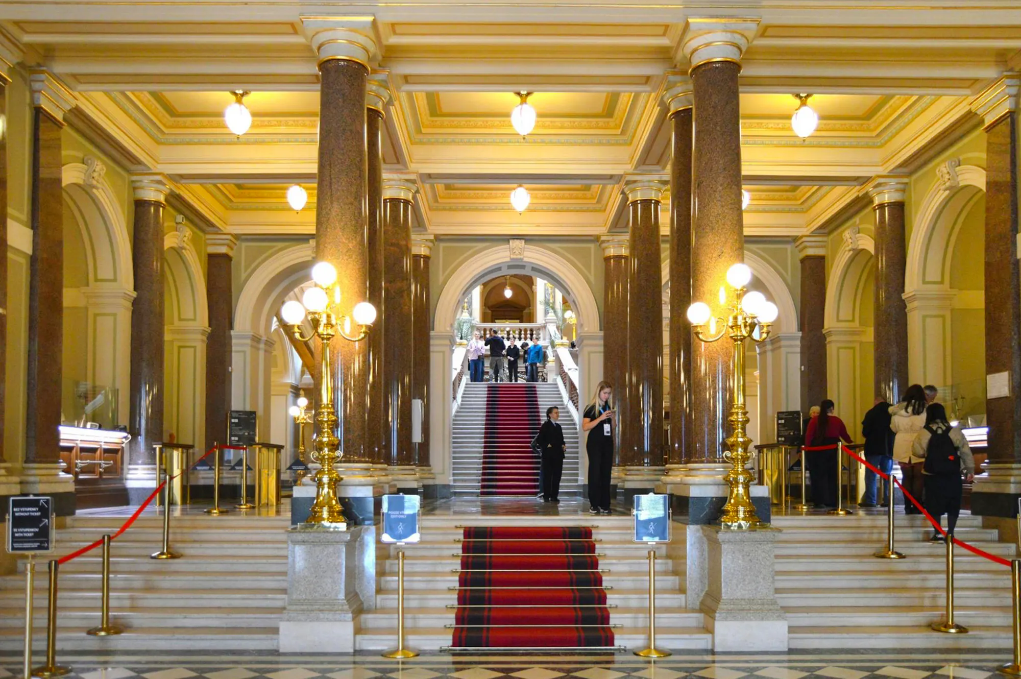 Grand staircase and ornate interior of the National Museum, Prague.