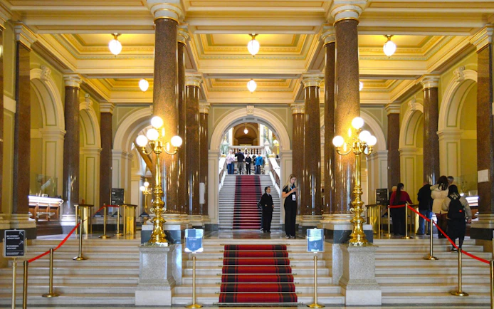 Grand staircase and ornate interior of the National Museum, Prague.