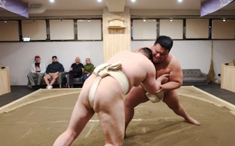 Sumo wrestlers competing at Shibuya Sumo Show in Tokyo.