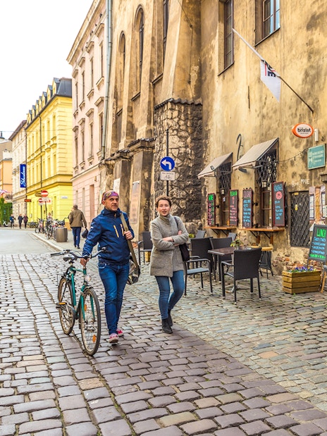 Krakow Jewish Ghetto street with historical buildings and cobblestone path.