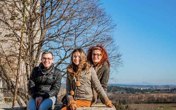 Visitors enjoying the view at Montmajour Abbey, France.