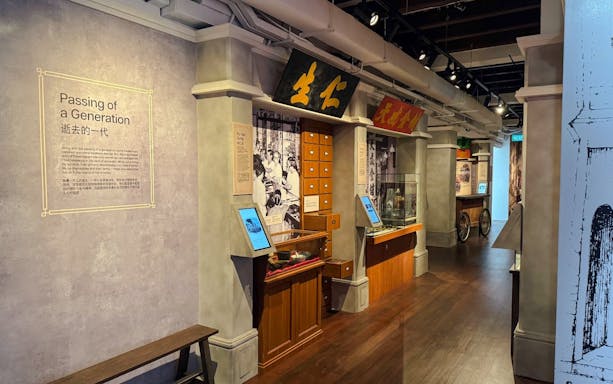 Interior exhibit at Chinatown Heritage Centre showcasing traditional Chinese medicine shop.